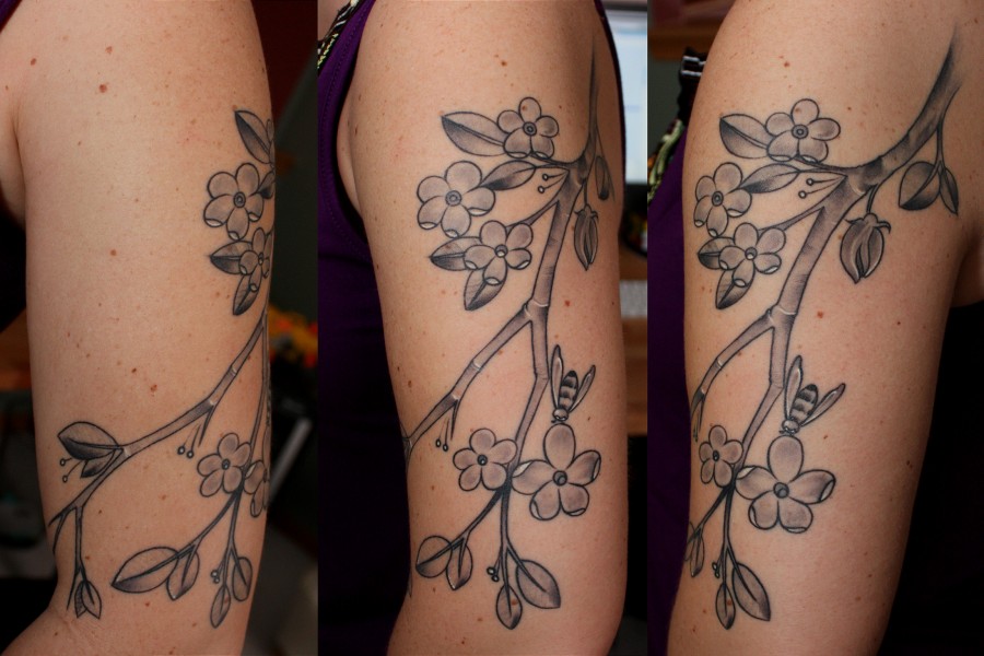 Apple blossom arm tattoo
