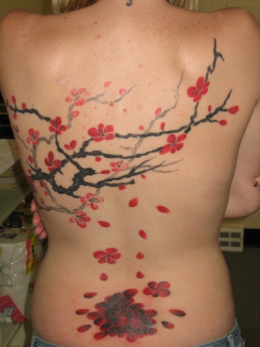 Apple blossom back tattoo