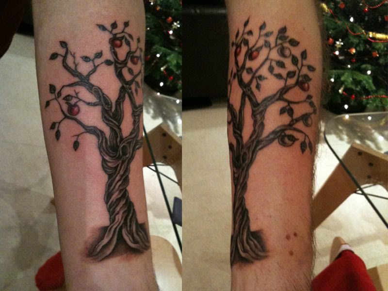 Apple tree arm tattoo