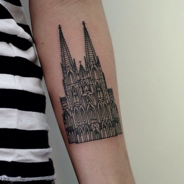 Arm’s Gothic style architecture tattoo