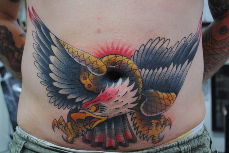 Attacking eagle stomach tattoo