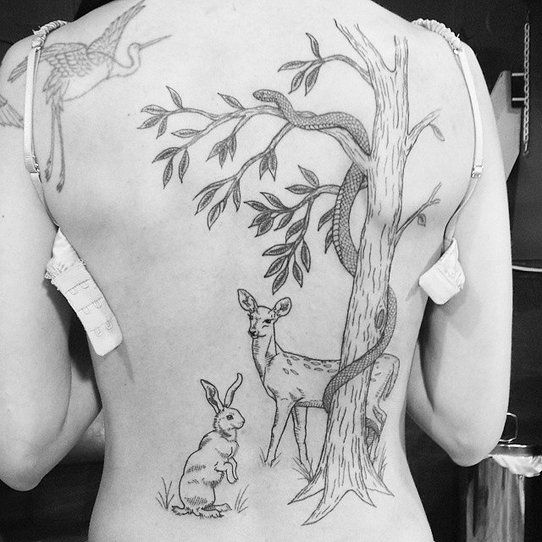 Awesome animals back tattoo