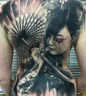 Awesome back tattoo by Florian Karg