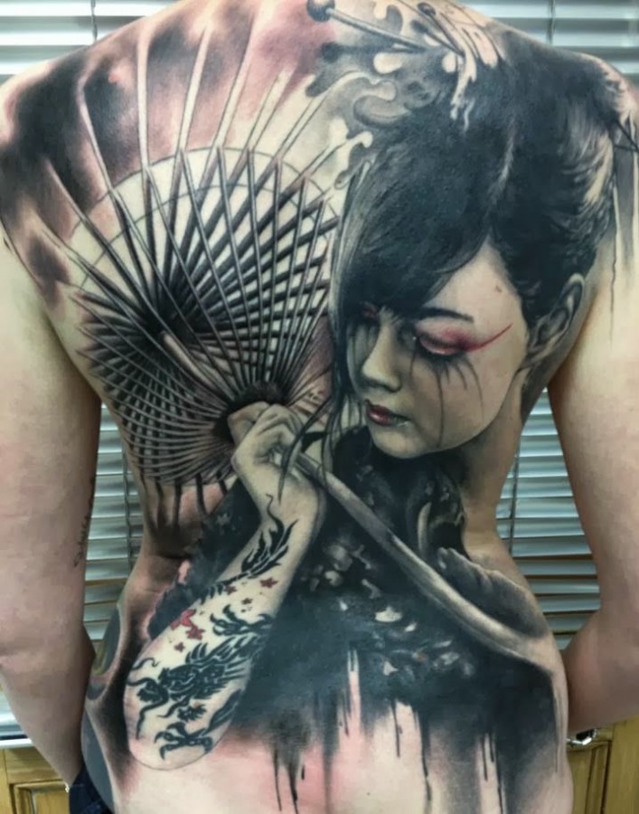 Awesome back tattoo by Florian Karg
