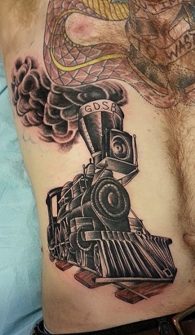 Awesome black train tattoo