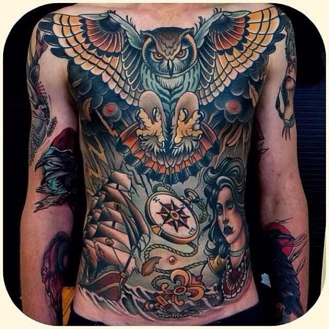 Awesome body tattoo by W. T. Norbert