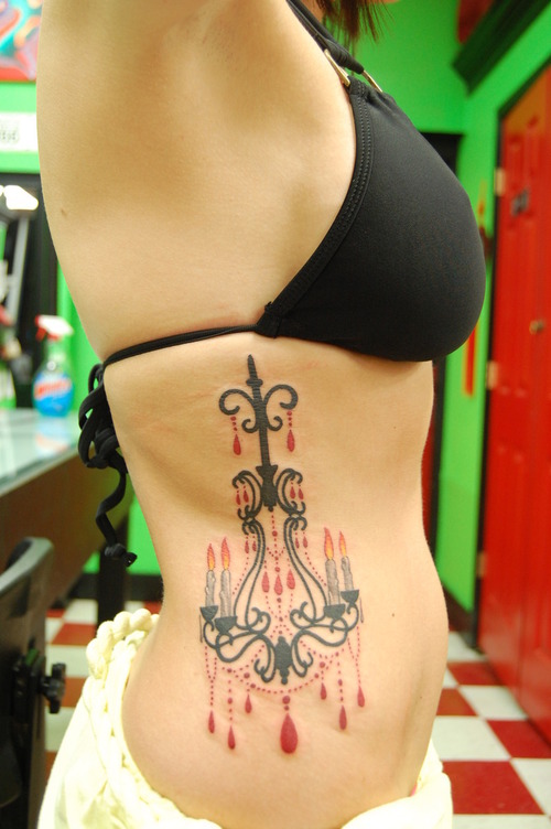 Awesome chandelier side tattoo