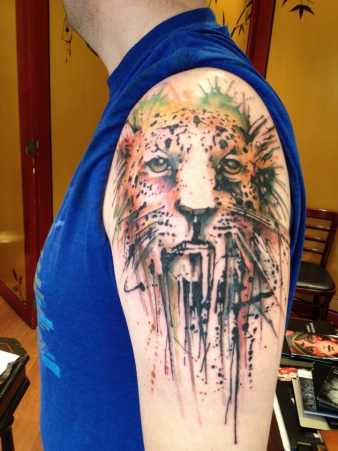 Awesome cheetah arm tattoo