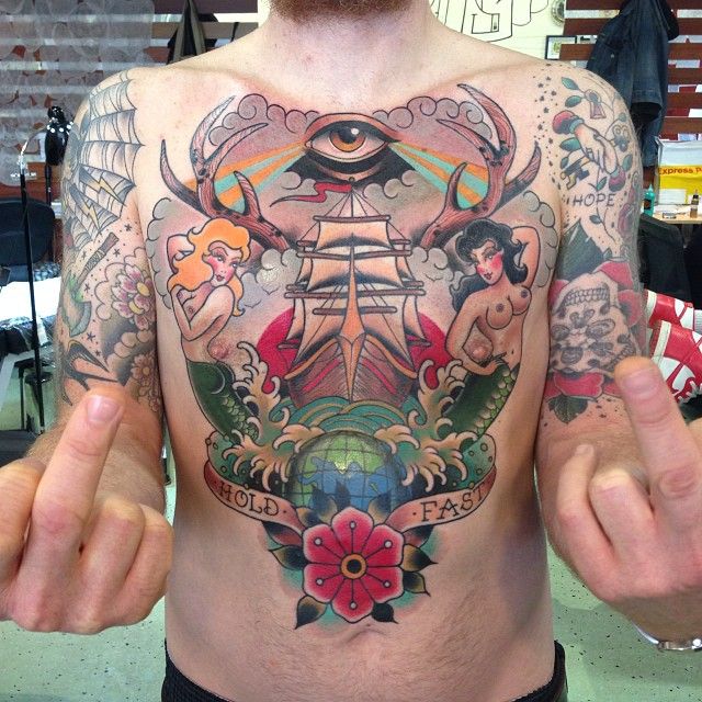 Awesome chest tattoo by Clare Hampshire