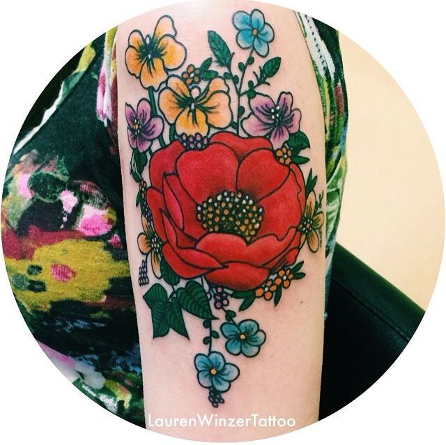 Awesome flowers tattoo by lauren winzer