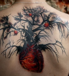 Awesome heart root apple tree tattoo