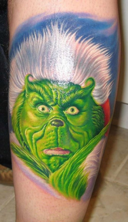 Awesome looking grinch christmas tattoo