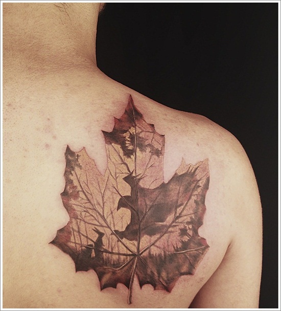Awesome maple leaf back tattoo