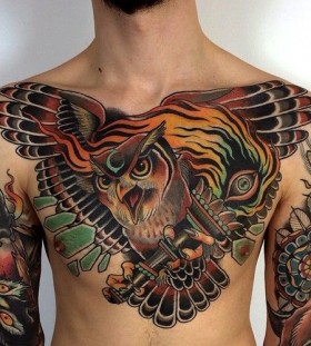 Awesome owl chest tattoo by Alex Dorfler