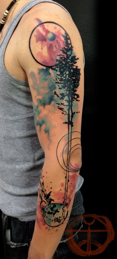Awesome pine tree arm tattoo