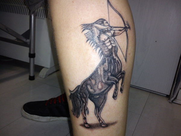 Awesome sagittarius leg tattoo