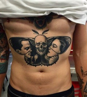 Awesome skull tattoo by Dan Molloy