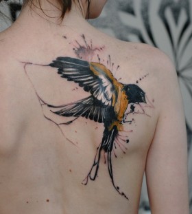 Awesome swallow back tattoo