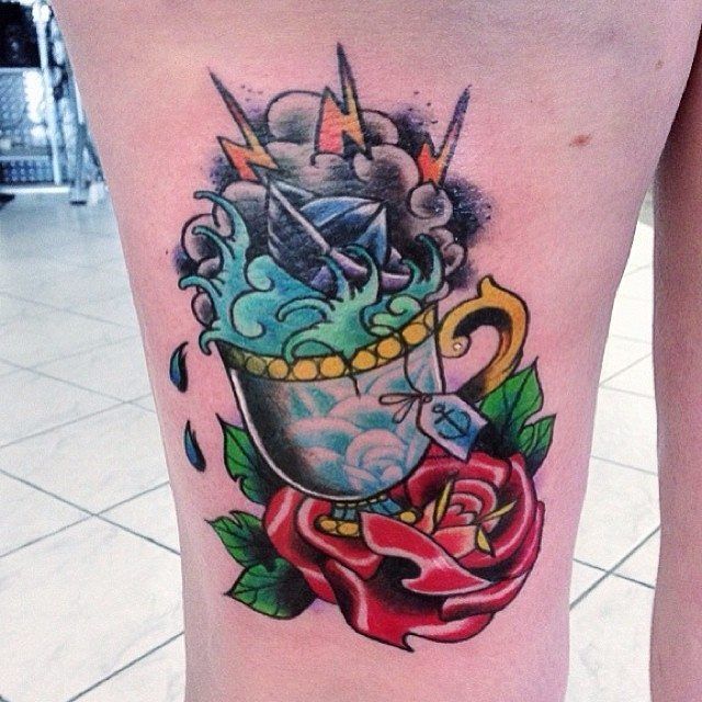 Awesome teacup leg tattoo