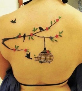 Awesome tree branch back tattoo