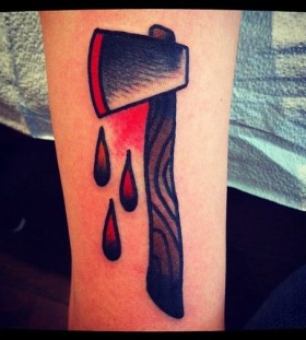 Axe and blood drops tattoo by Nick Oaks