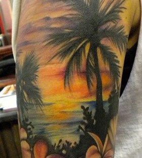 Beach and flowers tattoo by Amanda Leadman