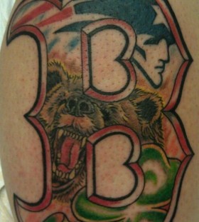 Bear and letter B sport tattoo