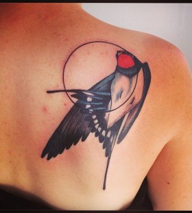Beautiful bird back tattoo