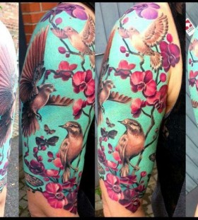 Beautiful birds and flowers tattoo by Ellen Westholm