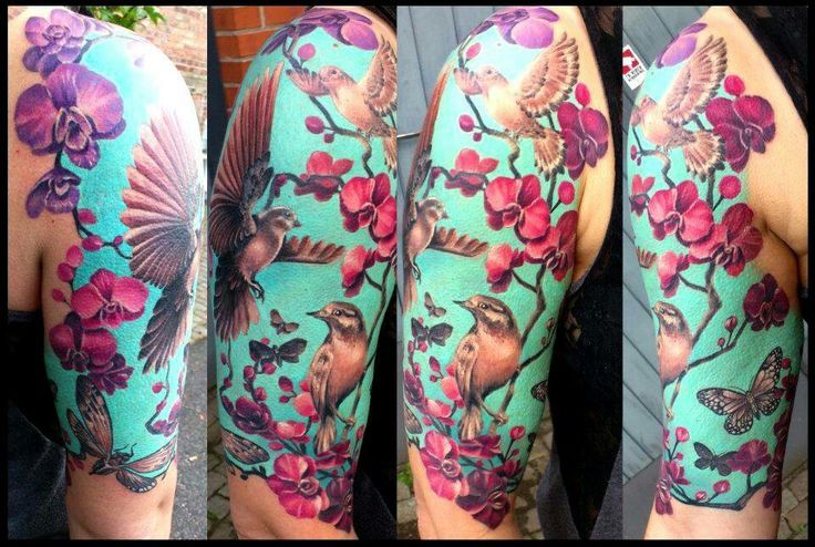 Beautiful birds and flowers tattoo by Ellen Westholm