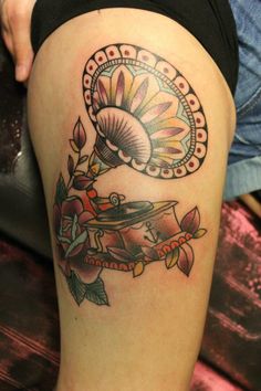 Beautiful gramophone leg tattoo