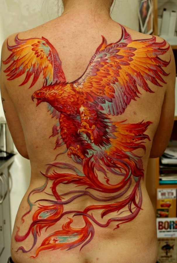 Beautiful phoenix back tattoo by Dmitriy Samohin