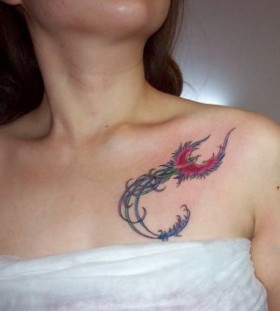 Beautiful phoenix collarbone tattoo