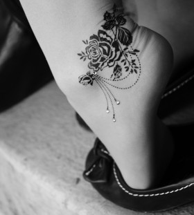 Beautiful rose ankle tattoo