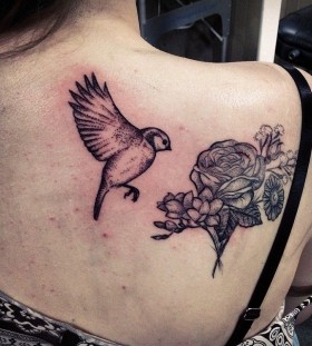 Bird and flowers back tattoo by Rebecca Vincent