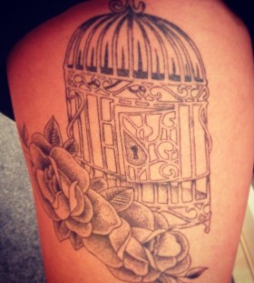 Birdcage and flowers tattoo