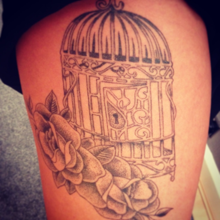 Birdcage and flowers tattoo