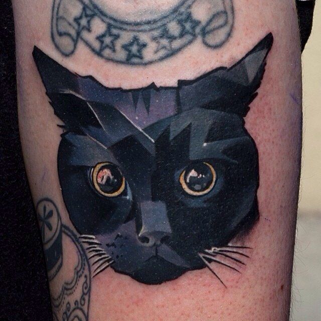 Shaded black cat tattoo