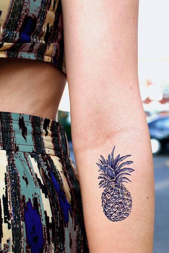 Black and blue fruit tattoo