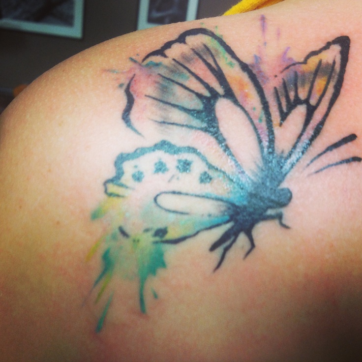 Black and purple watercolor butterfly tattoo