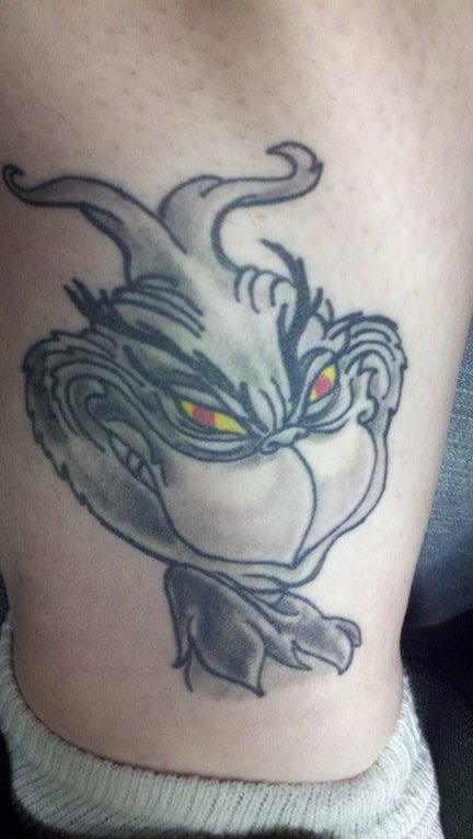 Black and white grinch christmas tattoo
