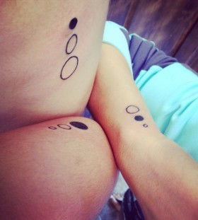 Black and white owal family love tattoo