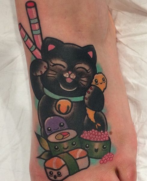 Black cat foot tattoo by Clare Hampshire
