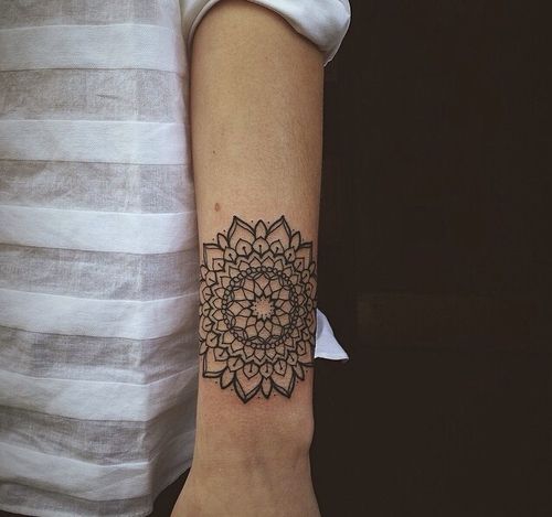 Black flower mandala tattoo