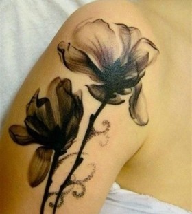 Black flowers watercolor tattoo