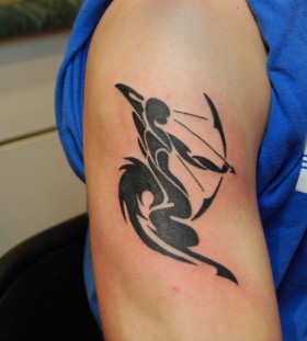 Black ink archer tattoo