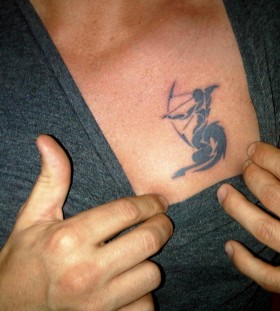 Black ink sagittarius chest tattoo