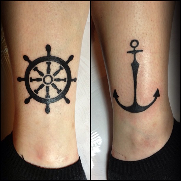 Black ink wheel tattoo
