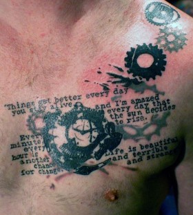 Black letters and sun clock tattoo