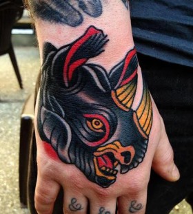 Black rhino hand tattoo